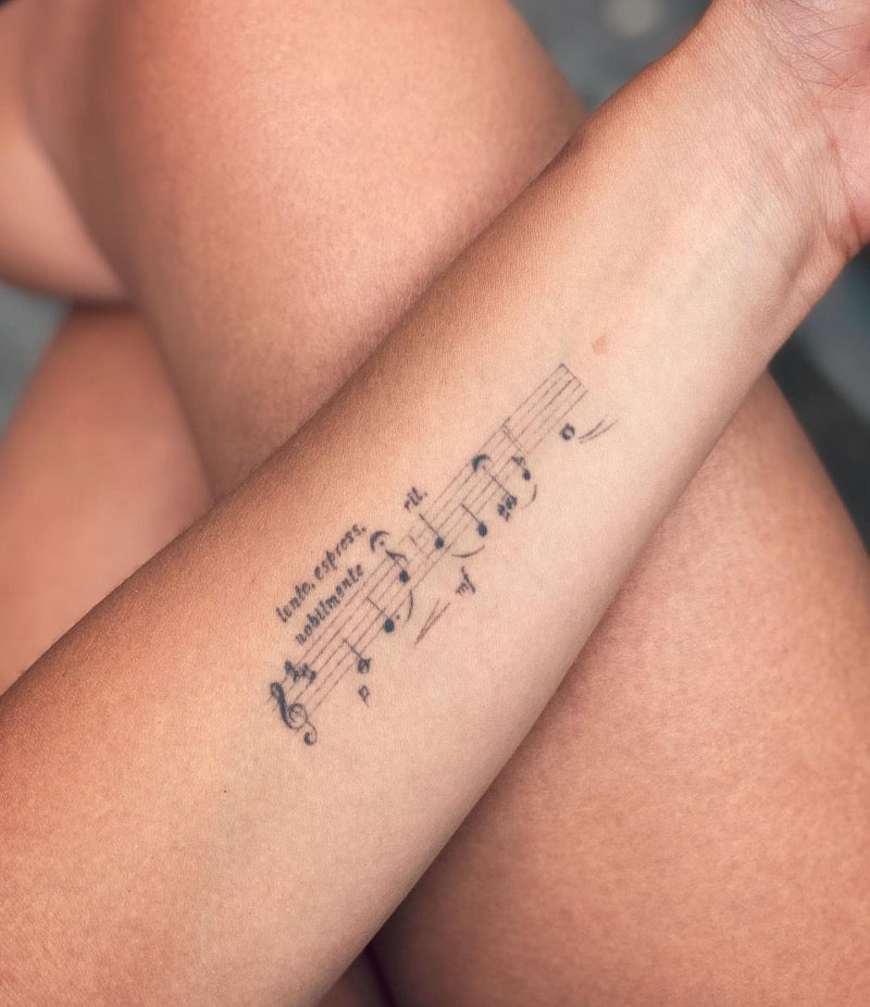 Musical notes tattoo hi-res stock photography and images - Alamy